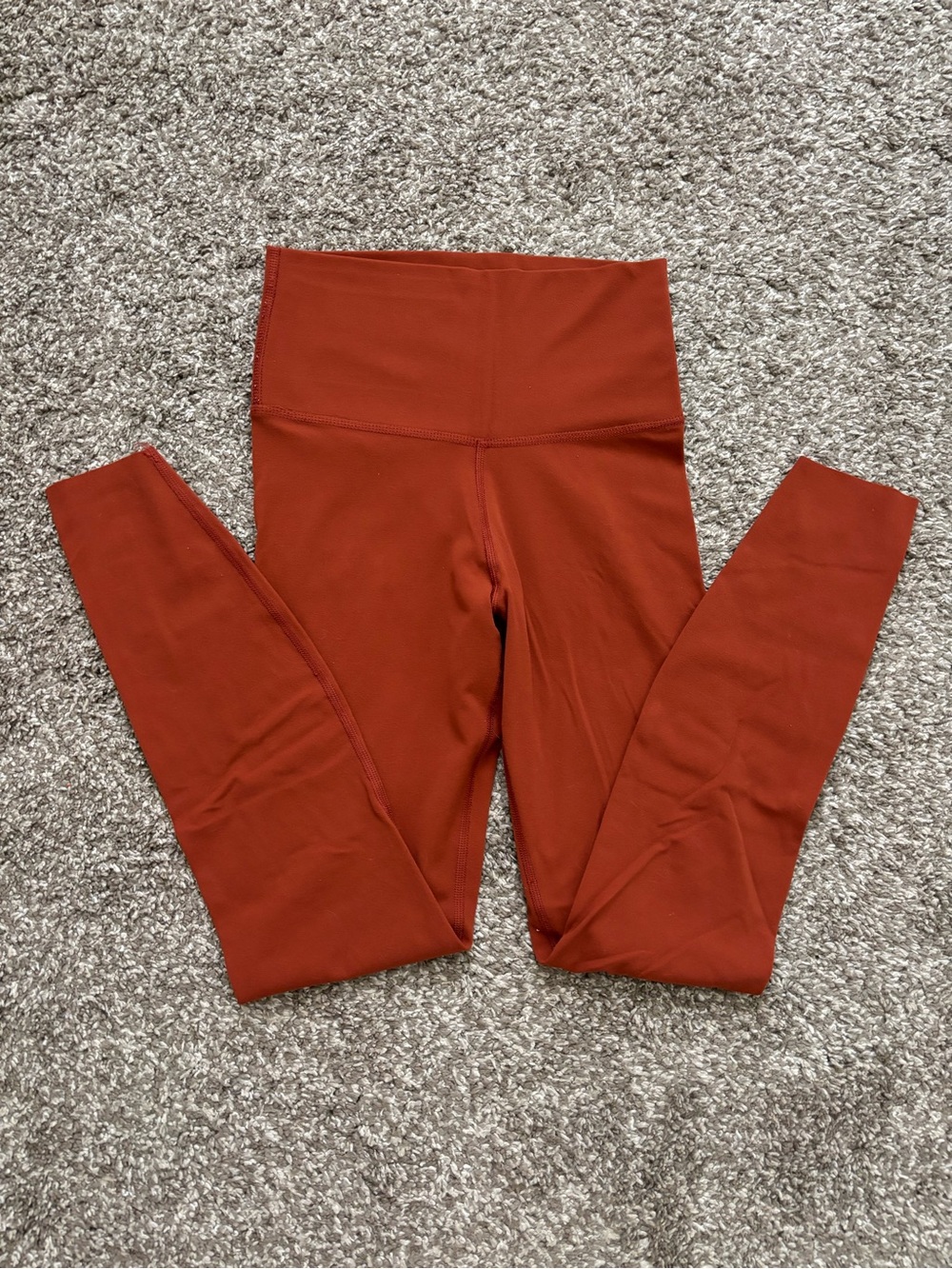 Nike High-Waisted Leggings in Rust Orange
